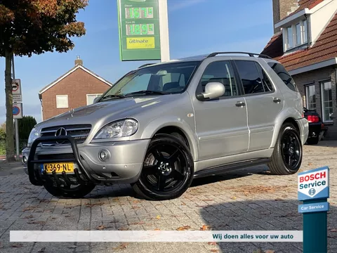 Mercedes Ml 55 AMG / Schuif-Kantel / Bose / Leder / Memory / Camera / Trekhaak / Stoelverwarming / Pdc / Cruise / Clima / Lichtmetaal / Youngtimer